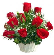 Basket arrangement of 12 red roses